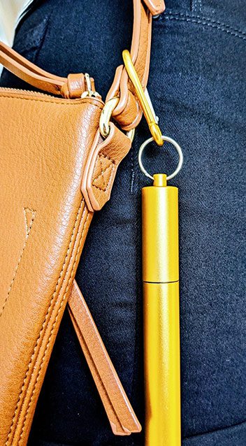 Yellow carabiner hang with bag bottom